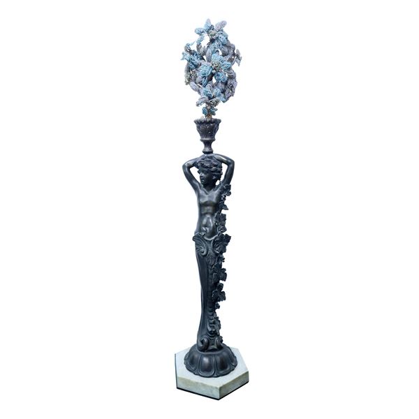 Caryatid on a marble base