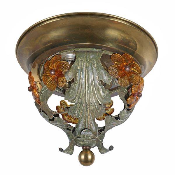 Small golden ceiling light with floral decorations in amber glass and leaves