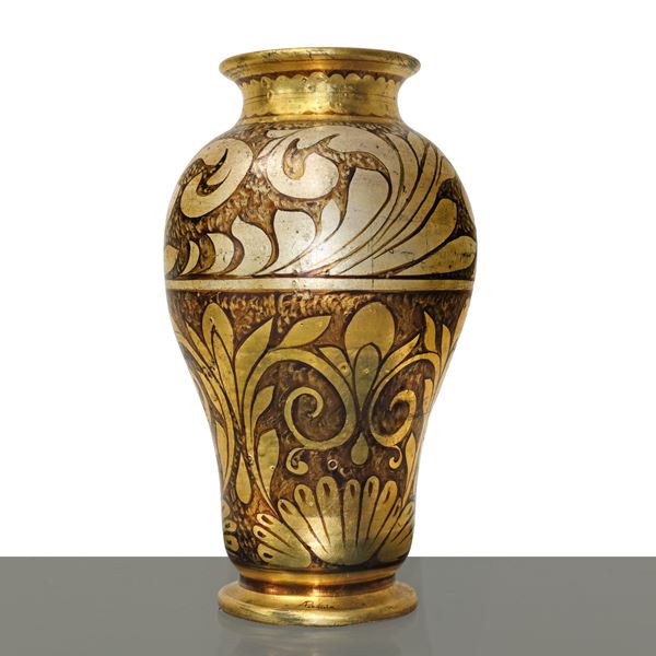 Majolica vase with large gold and silver leaves