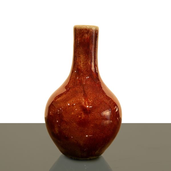 Small Chinese porcelain vase with oxblood red enamel coating