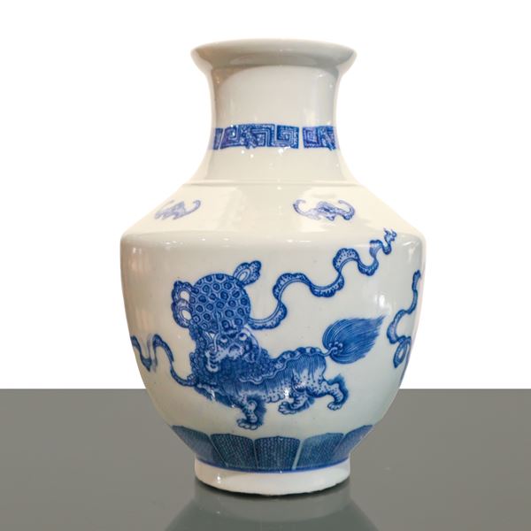 Blue and white Chinese porcelain vase decorated with Foo dogs