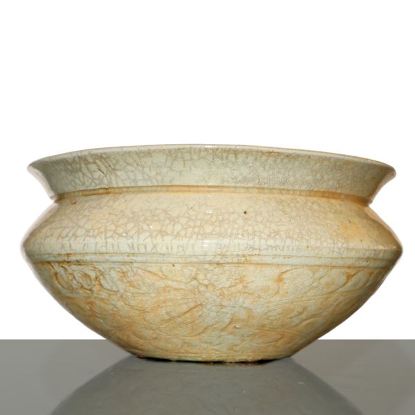 White glazed Chinese porcelain container with relief decorations