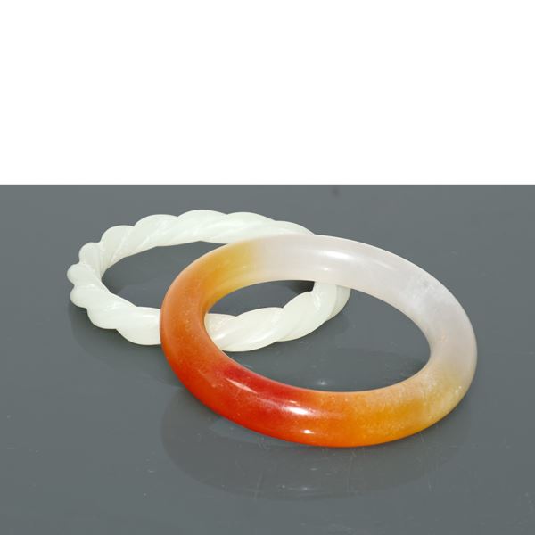 Pair of Chinese-made bracelets made of jade and jadeite respectively