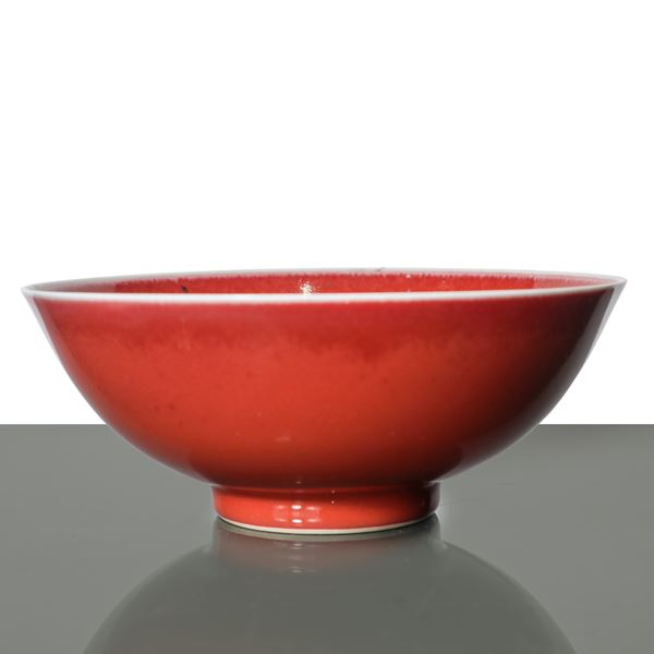 Chinese porcelain bowl with red enamel coating, Qing Dynasty