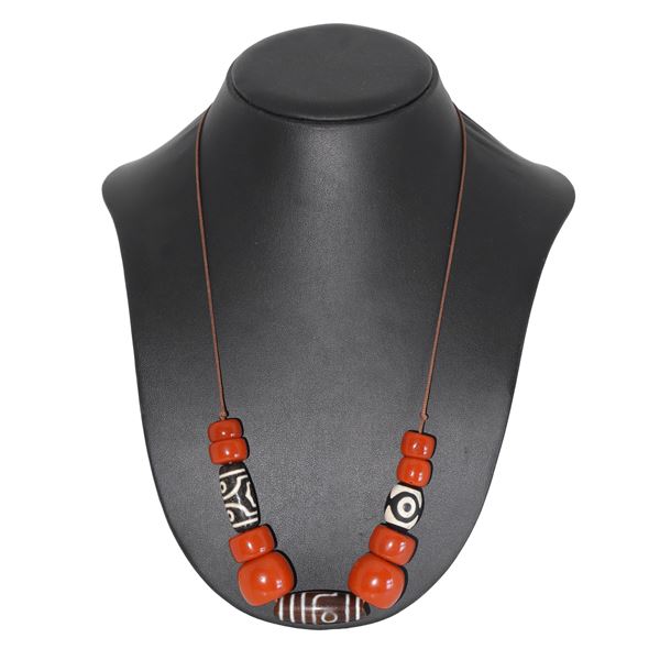 Necklace composed of ancient beads decorated with motifs and symbols typical of the Tibetan tradition