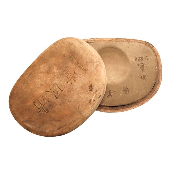 Chinese inkwell with inscriptions on the outside and inside