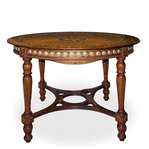 Round table with light wood inlays