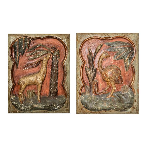 Pair of polychrome wooden paintings with carved animals