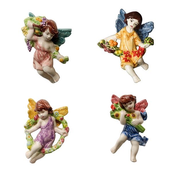 Polychrome majolica angels depicting the 4 seasons