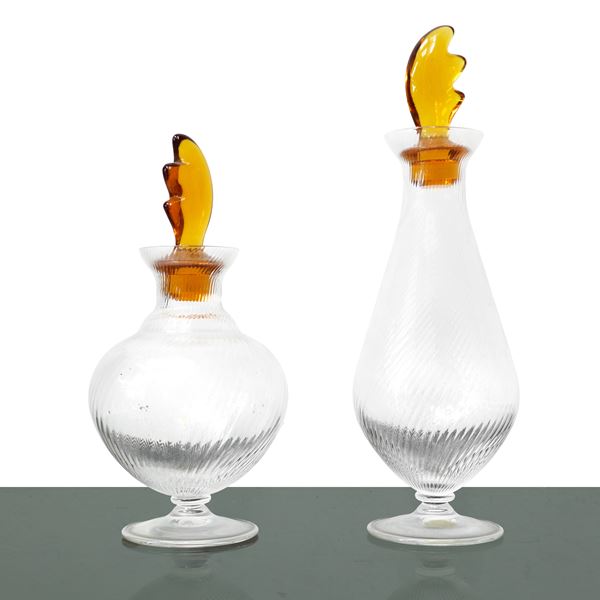 Pair of Murano filigree glass ampoules with amber glass stoppers