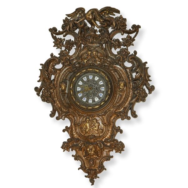 Orologio da muro in bronzo finemente cesellato