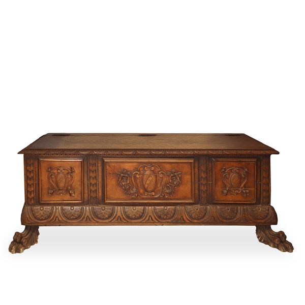 Chest with lion's feet and relief inlays