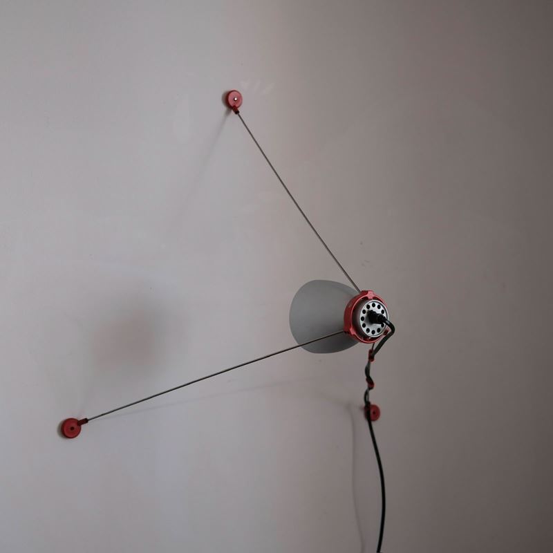 G.h. Tew per Artemide - Lampada multifunzionale modello Grifo adattabile da parete o da soffitto