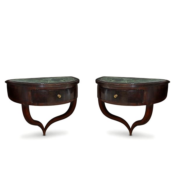 Pair of wall consoles with green marble recessed into the top