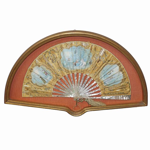 Fan with genre scene in a golden case