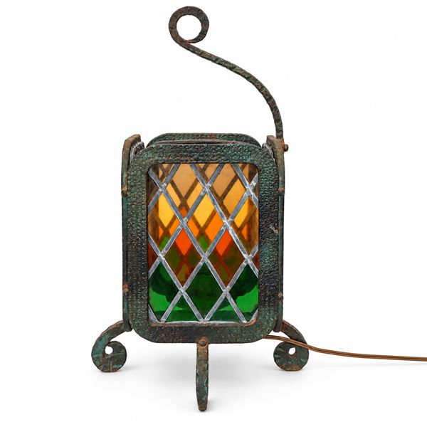 Vintage lantern in wrought iron and stained leaded glass