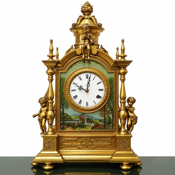 Rococo style mantel clock in hand-chiseled bronze with decorations of cherubs and gilding in pure gold with painted country and floral scenes