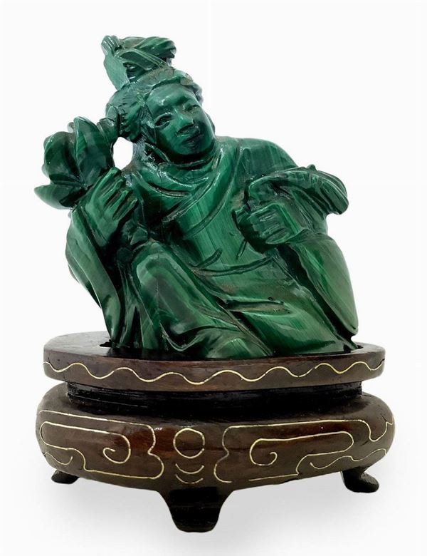 Small sculpture depicting malachite Chinese character with flower in hand. Cm 5.5x 4. Base cm 2 (right side gluing)