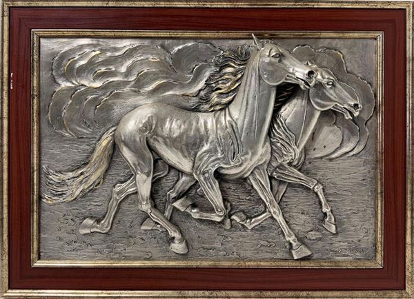 silver plate depicting pair of galloping horses, Mina Bernardo, twentieth century. Cm 38x57. Stamped 800 silver and Mina Signed on the lower right.

