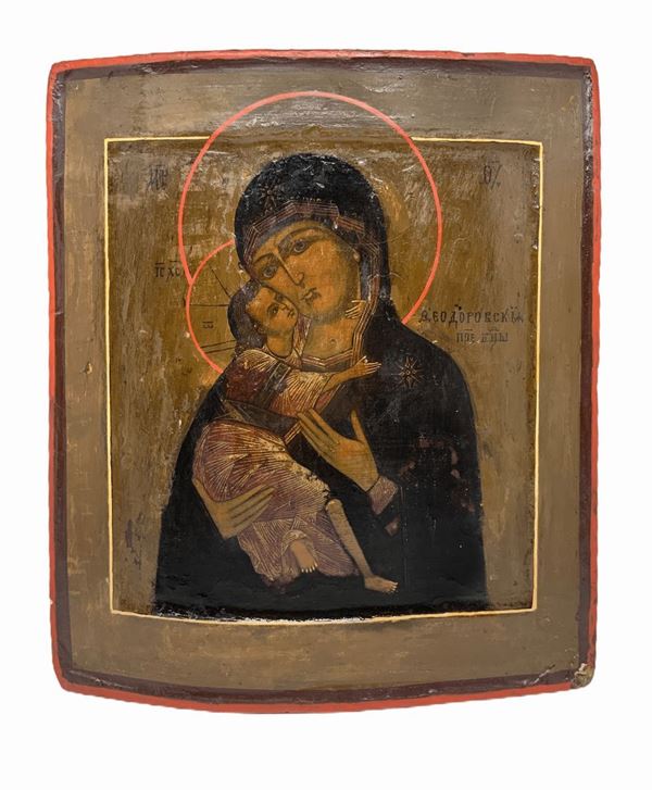 Icona russa con pittura a tempera  raffigurante Madonna di Vladimir , detta Madonna della tenerezza, secolo XIX. Cm 31 x 28