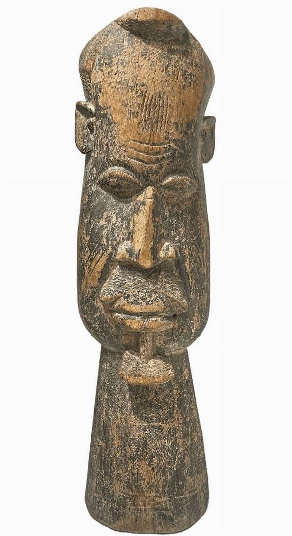 Mask, uncertain origin. First half of the twentieth century. H 88 cm