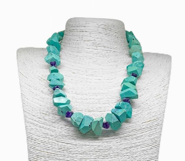 Turquoise necklace with framed geometric elements by faceted amethyst, silver closure. Length 54 cm
