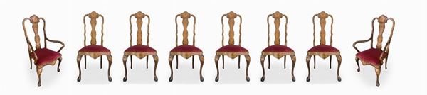 Gruppo di 6 sedie e 2 capitavola, XIX secolo, Olanda. Con intarsi floreali in legni chiari sul fronte e sul retro.