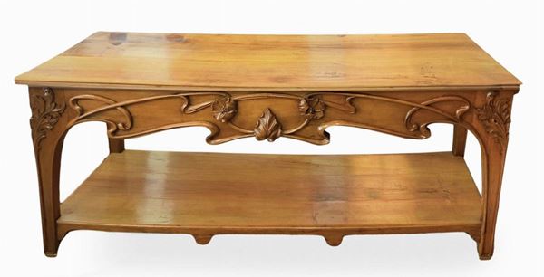 Pregiato tavolo da sartoria Liberty, attrib. Arch. Ernesto Basile. Con intagli floreali a rilievo. Primi ‘900. H cm 216 X 80
