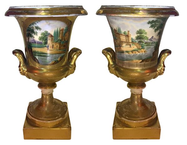 Pair of vases crater, Empire first half of the nineteenth century, France. With scenes of landscapes and characters. H 25 cm