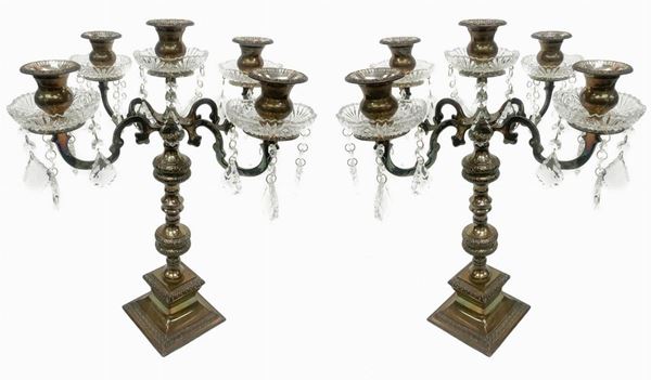 Pair of candlesticks in royal shieffiled (England), five lights, the twentieth century. Square base with brindoli and glass saucers ground. H 48 cm