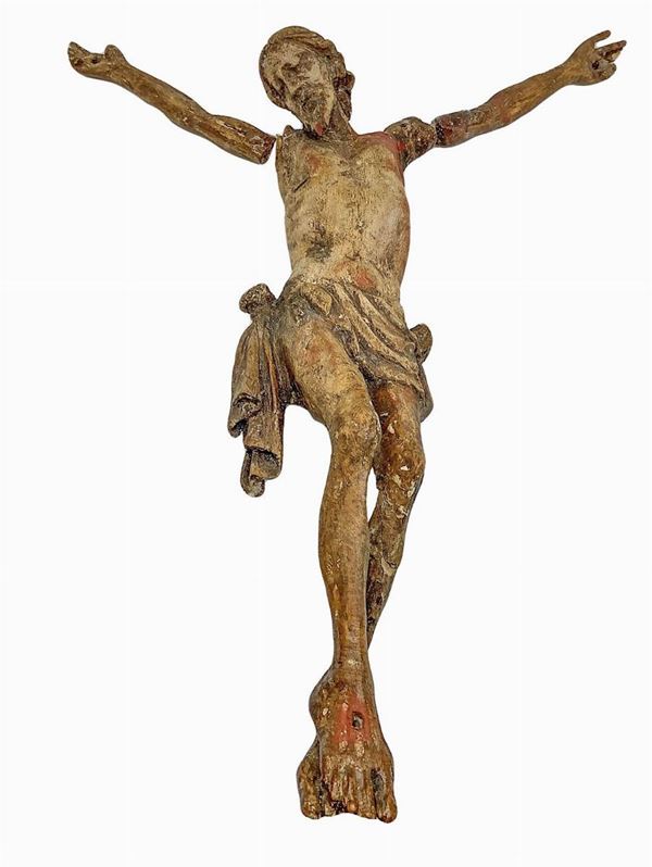 Wooden sculpture depicting Christ. XVI century. H cm 38. Arms in need of restoration.