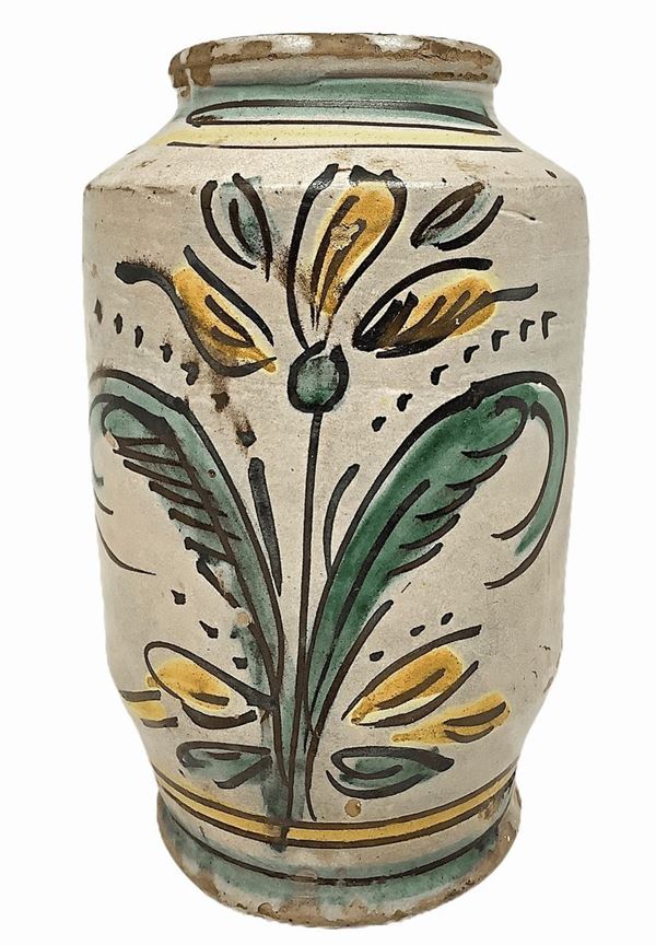 Cylinder majolica of Caltagirone, dated 1844 at the back, floral decoration broad acanthus leaves in shades of green and yellow. H 22 cm
