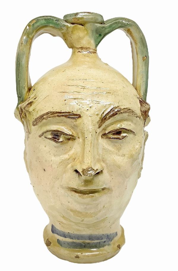 Flask anthropomorphic, nineteenth century. H 23 cm
