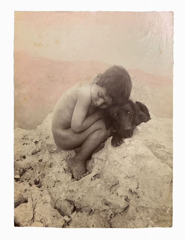 Wilhelm von Gloeden (1856-1931), albumin photos depicting child crouching with dog. Numbered 1258 and hallmarked on the back. Published on page 15 of the book Love and Art Wilhelm von Gloeden, and. Avvenire 2000 Messina, Malambri author. Cm 11,5x16

"Wilhelm Von Gloeden was a German-born photographer who spent most of his life in Sicily, specifically in Taormina, a city that he chose as a second home. It was the youth health issues to take in the peninsula. Specifically, the choice of Taormina