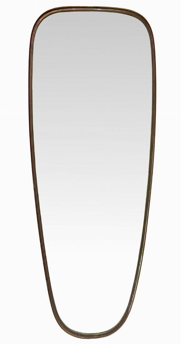 Specchiera anni '50, struttura in ottone lucido con modanature interne, di forma oblunga, Giò Ponti attribuibile. Cm 95x33