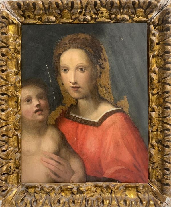 Dipinto ad olio su tavola raffigurante Madonna con bambino, pittore italiano della fine del XVI secolo. Cornice in legno scolpito e dorato. Cm 48x39, ... 
