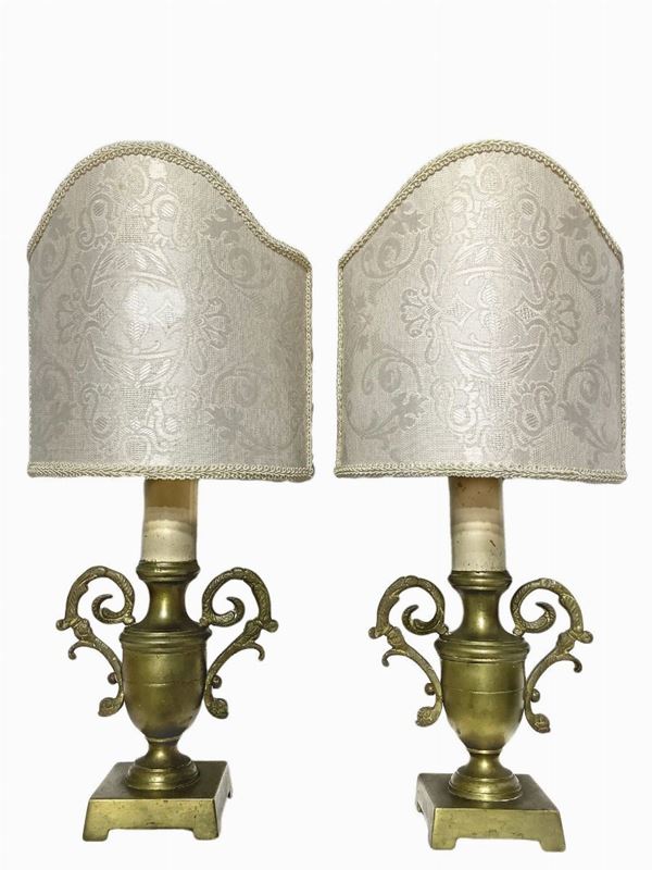 Pair of small gilded bronze lamps in the shape of amphorae, with fans