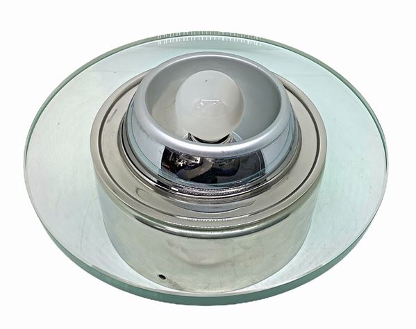 Applique, prod.italiana. With chromed metal frame and diffuser in transparent round shaped glass. 70's