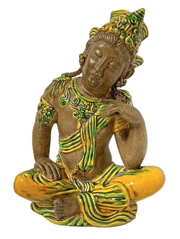 Eastern Divinity polychrome terracotta. H 40x31 cm