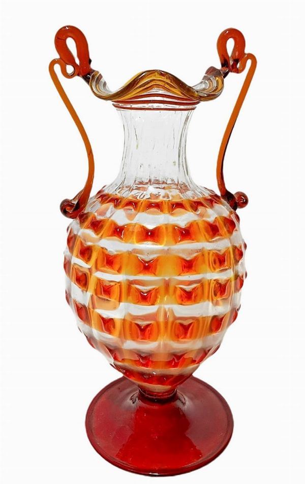 Toso brothers, ribbed bean-white vase, corrugated edge and curl loops. Italy, 1920s, colorless blown glass with innards. ...