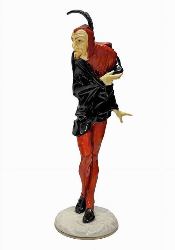 Statuina in porcellana L.H.S. Germany raff."MEFISTOFELE" piccola mancanza mano sx. 
h.30 cm.
