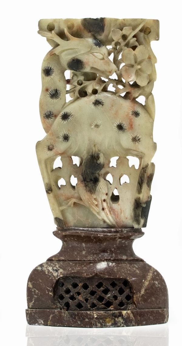 Oriental sculpture depicting a candle holder, China. H cm 21
