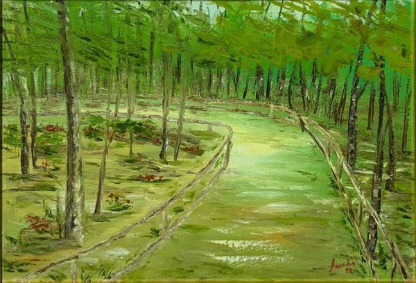 Olio su terra raffigurante sentiero nel bosco. Cm 50x70, in cornice cm 72x92. Firmata in basso a destra Aurelia ’92.