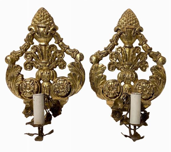 Pair of appliques gilted wood, XIX / XX century. H 28 cm.