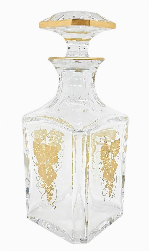 Baccarat, crystal bottle with zecchino gold decorations. Logo at 