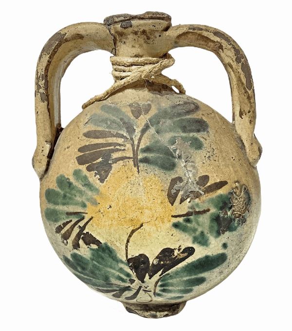 Flask majolica of Caltagirone, early twentieth century. H cm 24. With flower decorations of acanthus.