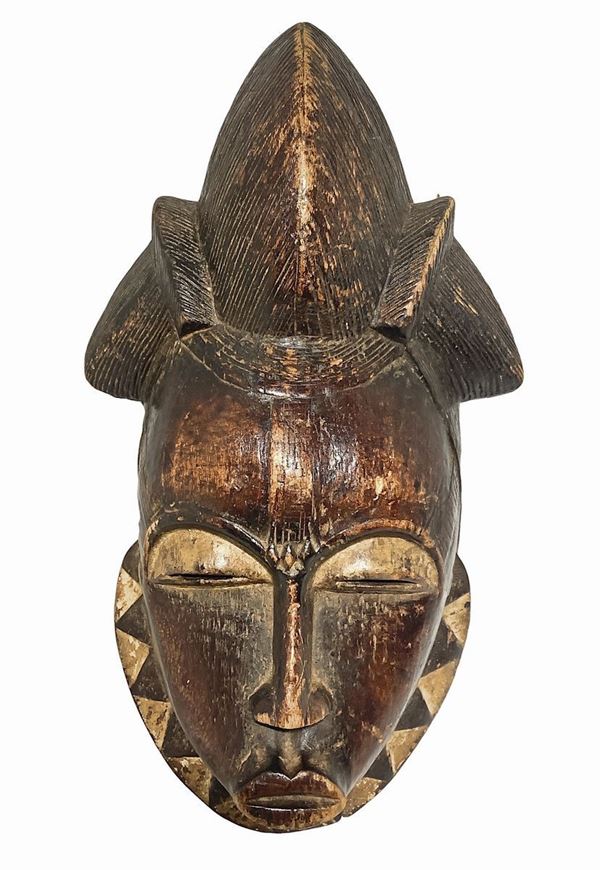 Baule's Mask, Ivory Coast, late twentieth century. H 41 cm