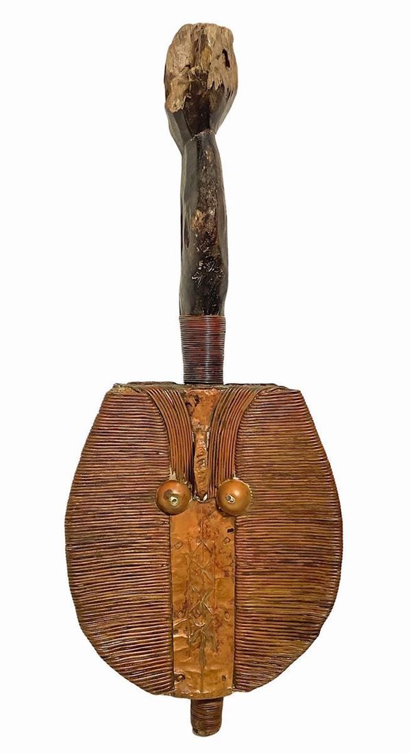 Reliquary, double KOTA face, copper and wood, Gaboninizi, XX secolo.H 57 cm