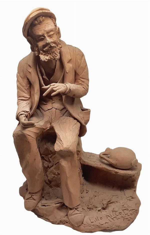 Monochrome terracotta figurine depicting an old man sitting with canteen