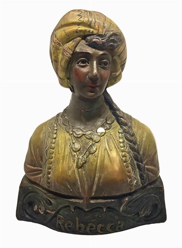 Mezzobusto in terracotta policroma raffigurante “Rebecca”, manifattura Palermo. H cm 25. Incollatura. Ceramica De Martino.
